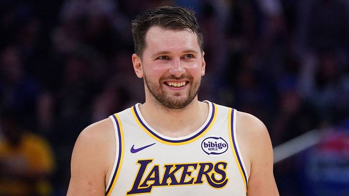 Feb 28, 2026; San Francisco, California, USA;  Los Angeles Lakers forward/guard Luka Doncic (77) smiles during a break in the action against the Golden State Warriors in the third period at Chase Center. Mandatory Credit: David Gonzales-Imagn Images