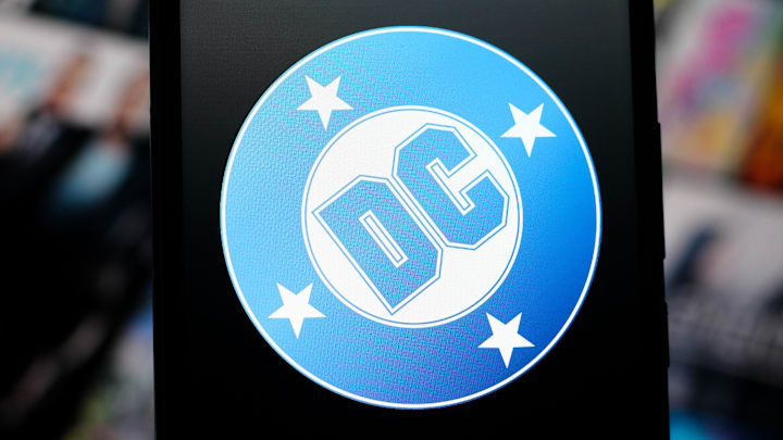 In this photo illustration, the DC Comics logo is seen.