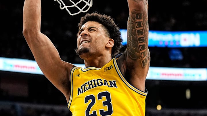Michigan forward Yaxel Lendeborg (23) dunks against Wisconsin during the second half of Big Ten Tournament semifinal at United Center in Chicago on Saturday, March 14, 2026. Michigan forward Yaxel Lendeborg (23) dunks against Wisconsin during the second half of Big Ten Tournament semifinal at United Center in Chicago on Saturday, March 14, 2026.