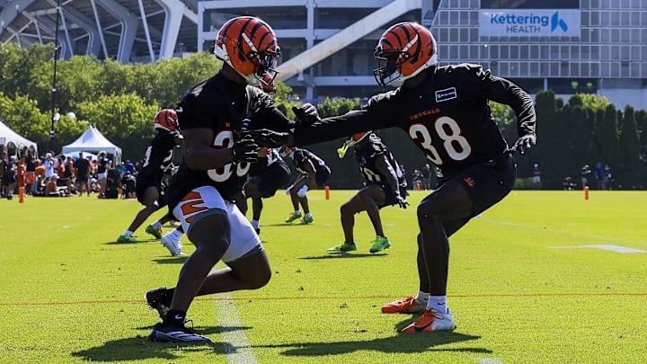 Jul 23, 2025; Cincinnati, OH, USA; Cincinnati Bengals cornerback Jalen Davis (35) and cornerback DJ Ivey (38) run drills during training camp at Kettering Health Practice Field. Mandatory Credit: Katie Stratman-Imagn Images