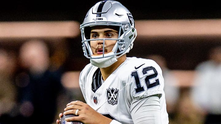Dec 29, 2024; New Orleans, Louisiana, USA; Las Vegas Raiders quarterback Aidan O'Connell (12) looks on against the New Orleans Saints during the second half at Caesars Superdome. Mandatory Credit: Stephen Lew-Imagn Images Dec 29, 2024; New Orleans, Louisiana, USA; Las Vegas Raiders quarterback Aidan O'Connell (12) looks on against the New Orleans Saints during the second half at Caesars Superdome. Mandatory Credit: Stephen Lew-Imagn Images