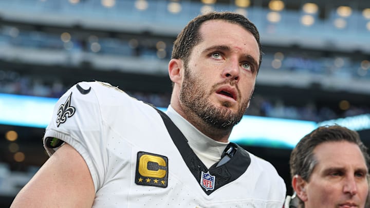 New Orleans Saints quarterback Derek Carr walks off the field after a game.