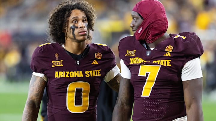 Nov 28, 2025; Tempe, Arizona, USA; Arizona State Sun Devils wide receiver Jordyn Tyson (0) with tight end Chamon Metayer (7) against the Arizona Wildcats during the 99th Territorial Cup at Mountain America Stadium. Mandatory Credit: Mark J. Rebilas-Imagn Images