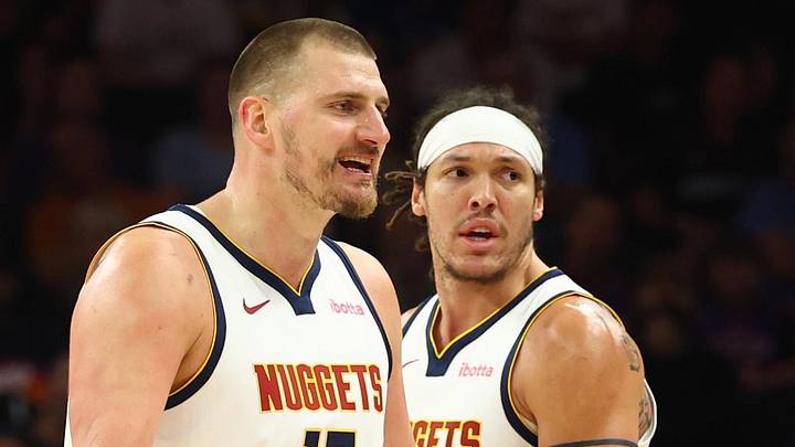 Mar 24, 2026; Phoenix, Arizona, USA; Denver Nuggets center Nikola Jokic (15) and forward Aaron Gordon (32) against the Phoenix Suns at Mortgage Matchup Center. Mandatory Credit: Mark J. Rebilas-Imagn Images