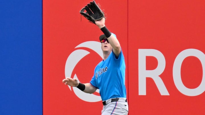 Miami Marlins right fielder Owen Caissie (17) catches a fly ball