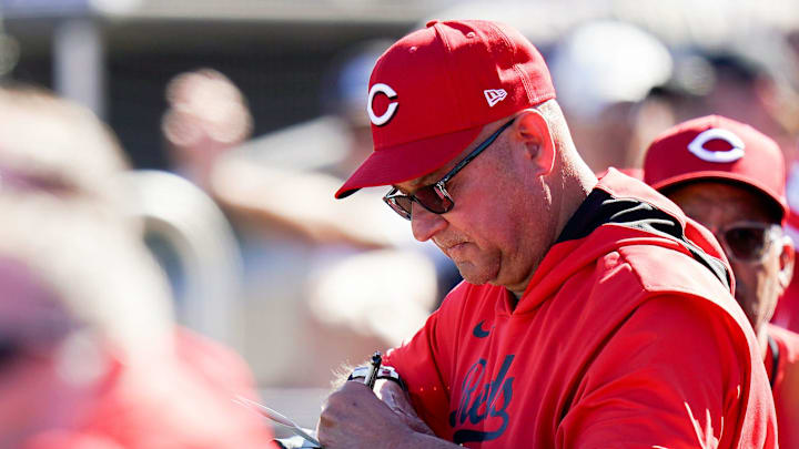 Cincinnati Reds manager Terry Francona takes notes during a Cactus League game between the Cincinnati Reds and San Francisco Giants, Sunday, Feb. 23, 2025, at Scottsdale Stadium in Scottsdale, Ariz.