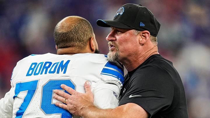 Detroit Lions head coach Dan Campbell hugs offensive lineman Larry Borom during warmups ahead of Bills game Detroit Lions head coach Dan Campbell hugs offensive lineman Larry Borom during warmups ahead of Bills game
