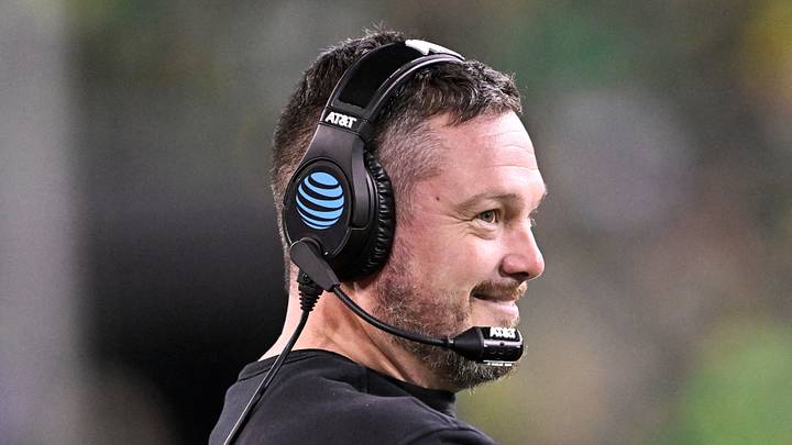 Dec 20, 2025; Eugene, OR, USA; Oregon Ducks head coach Dan Lanning smiles during the third quarter against the James Madison Dukes at Autzen Stadium. Dec 20, 2025; Eugene, OR, USA; Oregon Ducks head coach Dan Lanning smiles during the third quarter against the James Madison Dukes at Autzen Stadium.