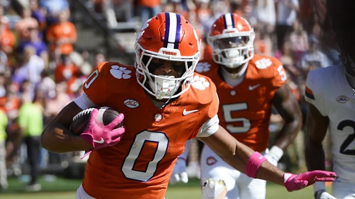 Oct 19, 2024; Clemson, South Carolina, USA; Clemson Tigers wide receiver Antonio Williams (0) runs the ball against the Virginia Cavaliers at Memorial Stadium. Mandatory Credit: Alexander Hicks-Imagn Images