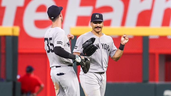 Jul 19, 2025; Atlanta, Georgia, USA; New York Yankees left fielder Cody Bellinger (35) and center fielder Trent Grisham (12) celebrate after a victory over the Atlanta Braves in the ninth inning at Truist Park. Mandatory Credit: Brett Davis-Imagn Images Jul 19, 2025; Atlanta, Georgia, USA; New York Yankees left fielder Cody Bellinger (35) and center fielder Trent Grisham (12) celebrate after a victory over the Atlanta Braves in the ninth inning at Truist Park. Mandatory Credit: Brett Davis-Imagn Images