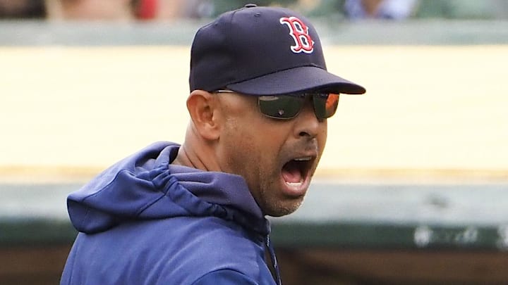 Boston Red Sox manager Alex Cora (20) reacts after a strike call during the sixth inning against the Oakland Athletics at Oakland Coliseum.