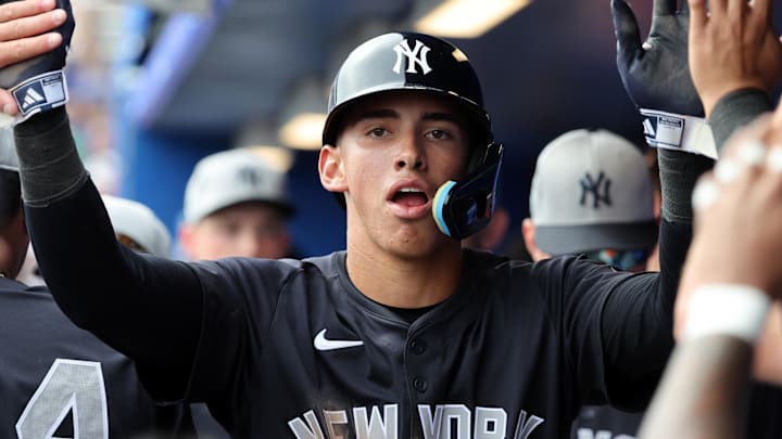 New York Yankees shortstop George Lombard Jr. (96) is congratulated after he scored a run during the sixth inning against the Toronto Blue Jays at TD Ballpark. Mandatory Credit: Kim Klement Neitzel-Imagn Images New York Yankees shortstop George Lombard Jr. (96) is congratulated after he scored a run during the sixth inning against the Toronto Blue Jays at TD Ballpark. Mandatory Credit: Kim Klement Neitzel-Imagn Images