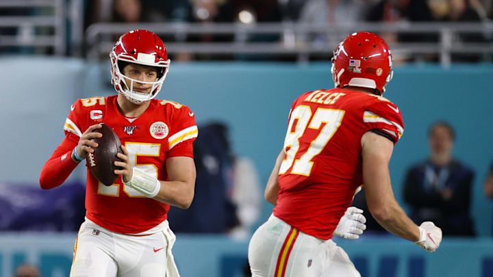 Feb 2, 2020; Miami Gardens, Florida, USA; Kansas City Chiefs quarterback Patrick Mahomes (15) prepares to throw to tight end Travis Kelce (87) against the San Francisco 49ers in Super Bowl LIV at Hard Rock Stadium. Mandatory Credit: Matthew Emmons-Imagn Images