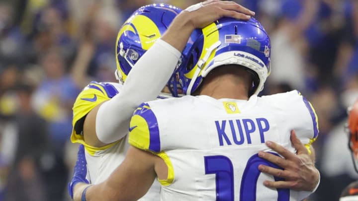 Dec 3, 2023; Inglewood, California, USA; Los Angeles Rams wide receiver Cooper Kupp (10) celebrates with Los Angeles Rams quarterback Mathew Stafford (9) after scoring a touchdown during the second half in a game against the Cleveland Browns at SoFi Stadium. Mandatory Credit: Yannick Peterhans-Imagn Images