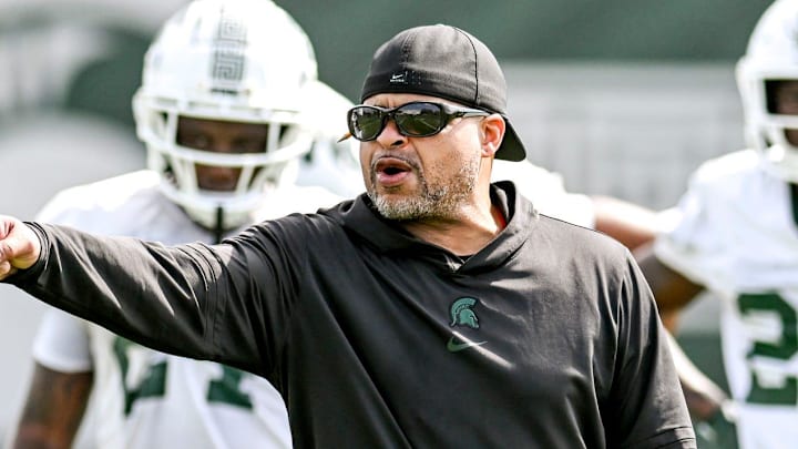Michigan State's cornerbacks coach Demetrice Martin works with players during the first day of football camp on Tuesday, July 30, 2024, in East Lansing. Michigan State's cornerbacks coach Demetrice Martin works with players during the first day of football camp on Tuesday, July 30, 2024, in East Lansing.