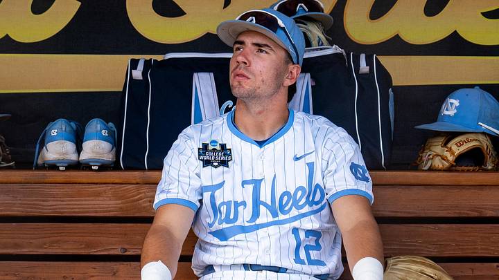 Jun 22, 2026; Omaha, NE, USA; North Carolina Tar Heels left fielder Tyler Howe (12) sits in the dugout before the game against the Oklahoma Sooners at Charles Schwab Field. Mandatory Credit: Dylan Widger-Imagn Images Jun 22, 2026; Omaha, NE, USA; North Carolina Tar Heels left fielder Tyler Howe (12) sits in the dugout before the game against the Oklahoma Sooners at Charles Schwab Field. Mandatory Credit: Dylan Widger-Imagn Images