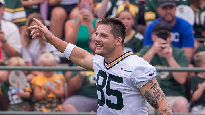 Green Bay Packers tight end Tucker Kraft (85) hypes up the crowd during practice on Friday, July 31, 2026, at Ray Nitschke Field in Ashwaubenon, Wisconsin.