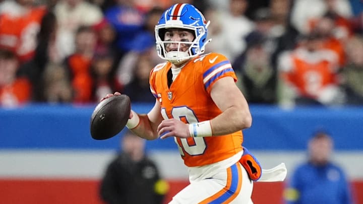 Nov 6, 2025; Denver, Colorado, USA; Denver Broncos quarterback Bo Nix (10) drops back to pass against the Las Vegas Raiders during the first half at Empower Field at Mile High. 