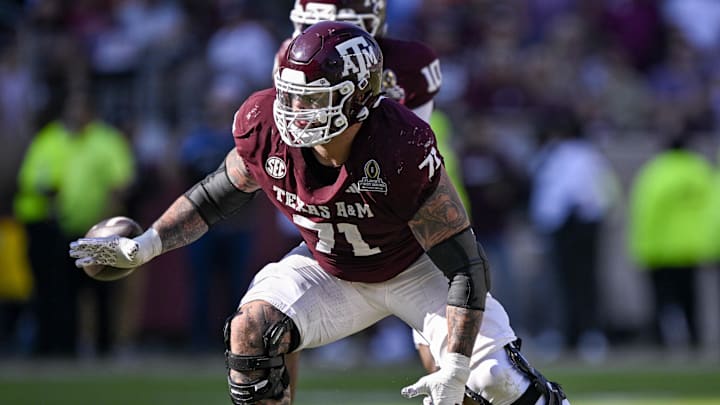 Dec 20, 2025; College Station, TX, USA; Texas A&M Aggies offensive lineman Chase Bisontis (71) blocks the rush during the game between the Aggies and the Hurricanes at Kyle Field. Mandatory Credit: Jerome Miron-Imagn Images