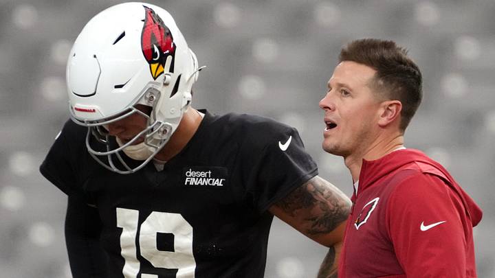 Arizona Cardinals head coach Mike LaFleur talks to quarterback Carson Beck (19) during training camp at State Farm Stadium in Glendale on Aug 2, 2026. Arizona Cardinals head coach Mike LaFleur talks to quarterback Carson Beck (19) during training camp at State Farm Stadium in Glendale on Aug 2, 2026.
