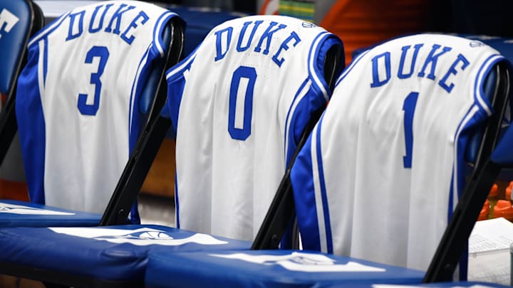 Nov 16, 2021; Durham, North Carolina, USA;  Starting player jerseys for the Duke Blue Devils are layed out on the bench prior to a game against the Gardner-Webb Runnin' Bulldogs  at Cameron Indoor Stadium. Mandatory Credit: Rob Kinnan-Imagn Images