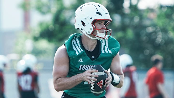 Louisville Cardinals quarterback Miller Moss during a morning practice Wednesday, July 30, 2025. Moss transferred from USC. His overall QB rating is 81.4. Louisville Cardinals quarterback Miller Moss during a morning practice Wednesday, July 30, 2025. Moss transferred from USC. His overall QB rating is 81.4.