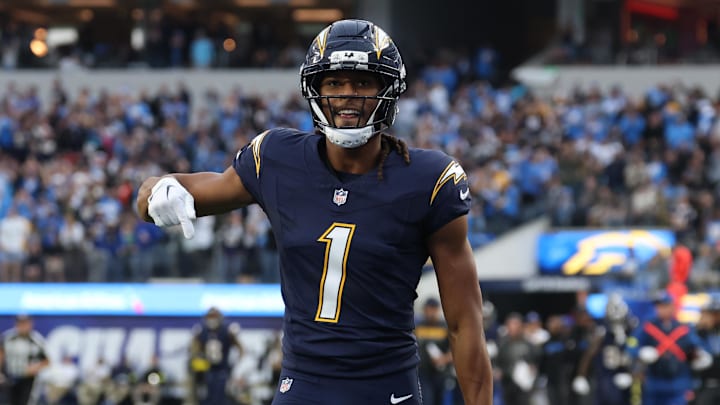 Quentin Johnston celebrates after huge 60 yard catch.