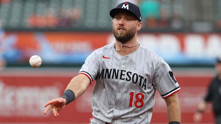 May 14, 2025; Baltimore, Maryland, USA; Minnesota Twins second baseman Kody Clemens (18) throws to first for an out during the seventh inning against the Baltimore Orioles at Oriole Park at Camden Yards