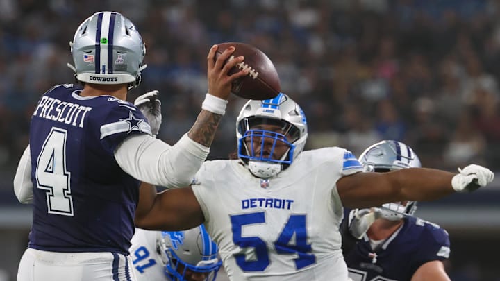 Oct 13, 2024; Arlington, Texas, USA;  Detroit Lions defensive tackle Alim McNeill (54) rushes Dallas Cowboys quarterback Dak Prescott (4) during the second half at AT&T Stadium. Mandatory Credit: Kevin Jairaj-Imagn Images