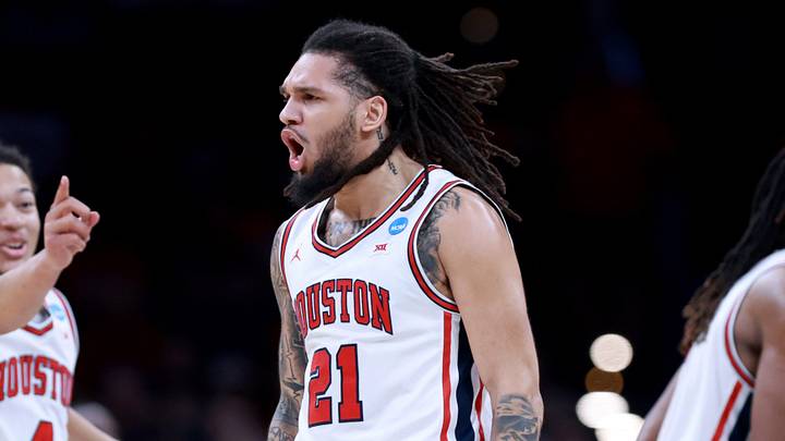 Houston's Emanuel Sharp (21) and Kingston Flemings celebrate during a second-round game in the NCAA men's basketball tournament between Houston Cougars and Texas A&M Aggies at Paycom Center in Oklahoma City, Saturday March 21, 2026. Houston's Emanuel Sharp (21) and Kingston Flemings celebrate during a second-round game in the NCAA men's basketball tournament between Houston Cougars and Texas A&M Aggies at Paycom Center in Oklahoma City, Saturday March 21, 2026.