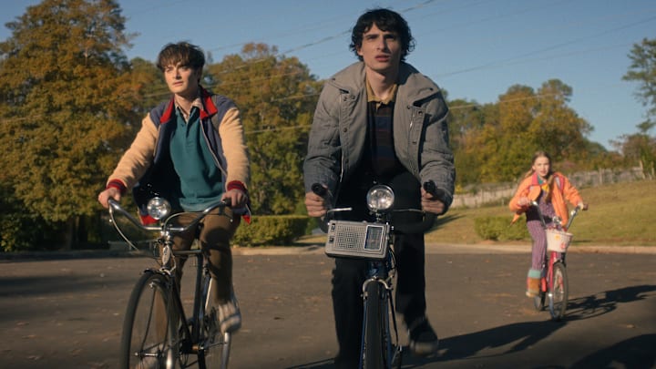 STRANGER THINGS: SEASON 5. (L to R) Noah Schnapp as Will Byers, Finn Wolfhard as Mike Wheeler, and Nell Fisher as Holly Wheeler in Stranger Things: Season 5. STRANGER THINGS: SEASON 5. (L to R) Noah Schnapp as Will Byers, Finn Wolfhard as Mike Wheeler, and Nell Fisher as Holly Wheeler in Stranger Things: Season 5.