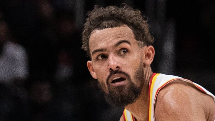 Trae Young #11 of the Atlanta Hawks dribbles.