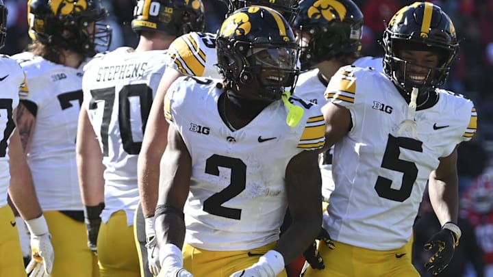 Nov 23, 2024; College Park, Maryland, USA;  Iowa Hawkeyes running back Kaleb Johnson (2) celebrates after scoring a touchdown during the first half against the Maryland Terrapins at SECU Stadium. Mandatory Credit: Tommy Gilligan-Imagn Images