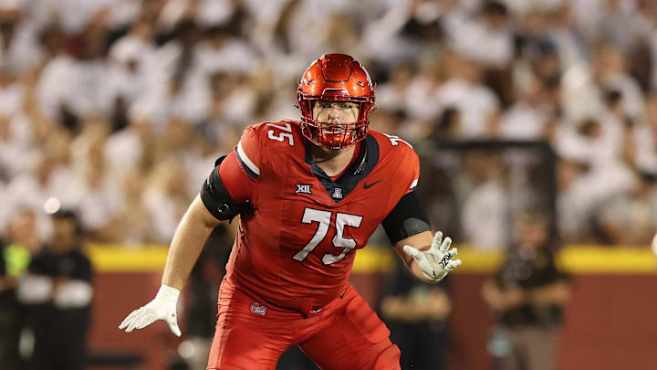 Sep 27, 2025; Ames, Iowa, USA; Arizona Wildcats offensive lineman Ty Buchanan (75) looks on during their game with the Iowa State Cyclones during the second half at Jack Trice Stadium. Mandatory Credit: Reese Strickland-Imagn Images