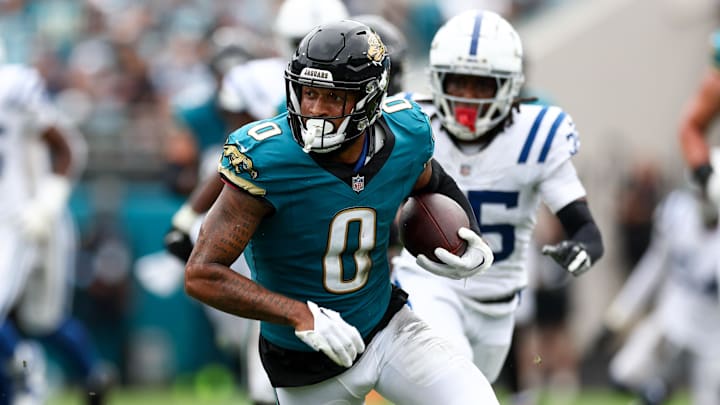 Oct 6, 2024; Jacksonville, Florida, USA; Jacksonville Jaguars wide receiver Gabe Davis (0) runs with the ball against the Indianapolis Colts in the second quarter at EverBank Stadium. Mandatory Credit: Nathan Ray Seebeck-Imagn Images