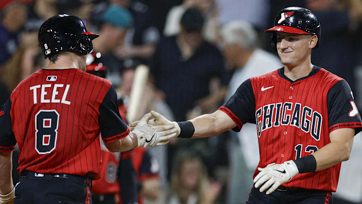 Chicago White Sox shortstop Colson Montgomery (12) celebrates with catcher Kyle Teel (8) after hitting a two-run home run against the Minnesota Twins at Rate Field. 