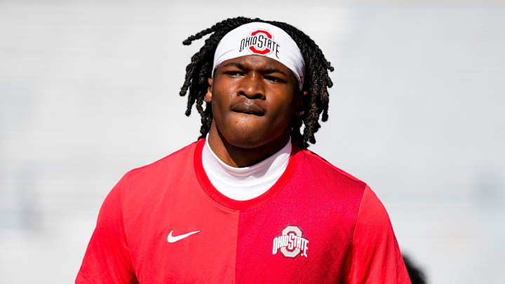 Ohio State Buckeyes wide receiver Jeremiah Smith (4) warms-up before the game against the Wisconsin Badgers at Camp Randall Stadium on Saturday, Oct. 18, 2025 in Madison, Wisconsin. Ohio State Buckeyes wide receiver Jeremiah Smith (4) warms-up before the game against the Wisconsin Badgers at Camp Randall Stadium on Saturday, Oct. 18, 2025 in Madison, Wisconsin.
