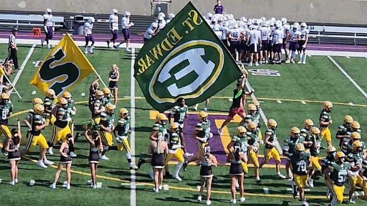 St. Edward football takes the field before a game against Elder on Sept. 14, 2024. 