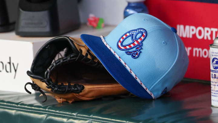 Jul 4, 2025; Atlanta, Georgia, USA; A detailed view of the Baltimore Orioles 4th of July hat in the dugout against the Atlanta Braves in the third inning at Truist Park. 