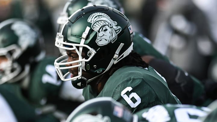Michigan State's Maliq Carr and the Spartans sport the gruff Sparty helmet for the game against Indiana on Saturday, Nov. 19, 2022, at Spartan Stadium in East Lansing.

221119 Msu Indiana 020a