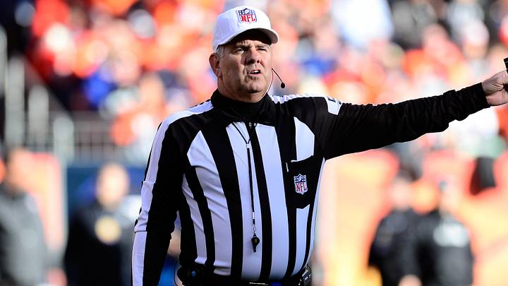 Dec 13, 2015; Denver, CO, USA; NFL referee Bill Vinovich (52) calls a down in the first quarter of the game between the Oakland Raiders against the Denver Broncos at Sports Authority Field at Mile High. Dec 13, 2015; Denver, CO, USA; NFL referee Bill Vinovich (52) calls a down in the first quarter of the game between the Oakland Raiders against the Denver Broncos at Sports Authority Field at Mile High.