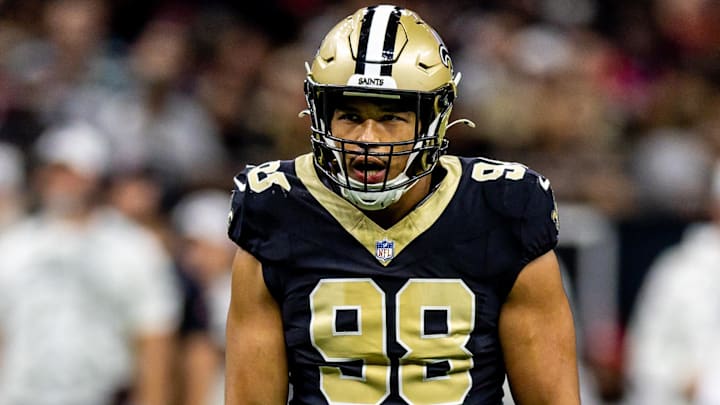 Nov 10, 2024; New Orleans, Louisiana, USA; New Orleans Saints defensive end Payton Turner (98) reacts to sacking Atlanta Falcons quarterback Kirk Cousins (18) during the first half at Caesars Superdome. Nov 10, 2024; New Orleans, Louisiana, USA; New Orleans Saints defensive end Payton Turner (98) reacts to sacking Atlanta Falcons quarterback Kirk Cousins (18) during the first half at Caesars Superdome.