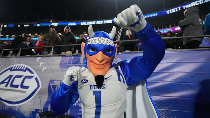 Dec 6, 2025; Charlotte, NC, USA; Duke Blue Devils mascot cheers during overtime against the Virginia Cavaliers during the 2025 ACC Championship game at Bank of America Stadium. Mandatory Credit: Bob Donnan-Imagn Images Dec 6, 2025; Charlotte, NC, USA; Duke Blue Devils mascot cheers during overtime against the Virginia Cavaliers during the 2025 ACC Championship game at Bank of America Stadium. Mandatory Credit: Bob Donnan-Imagn Images