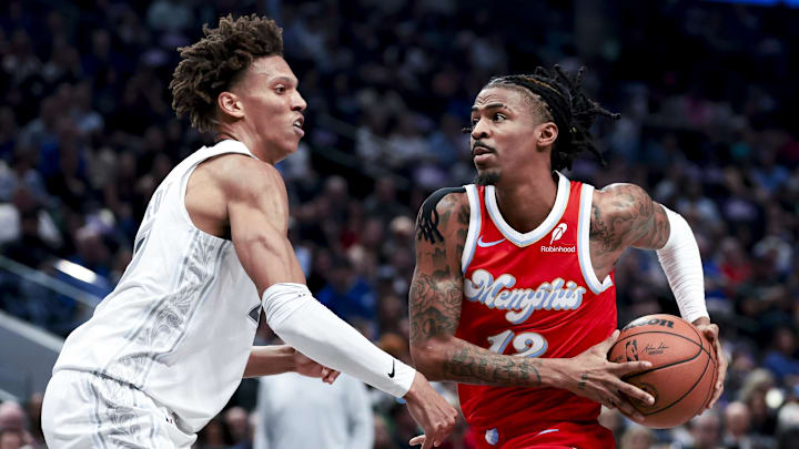 Mar 7, 2025; Dallas, Texas, USA; Memphis Grizzlies guard Ja Morant (12) drives to the basket as Dallas Mavericks forward Kessler Edwards (20) defends during the first half at American Airlines Center. Mandatory Credit: Kevin Jairaj-Imagn Images Mar 7, 2025; Dallas, Texas, USA; Memphis Grizzlies guard Ja Morant (12) drives to the basket as Dallas Mavericks forward Kessler Edwards (20) defends during the first half at American Airlines Center. Mandatory Credit: Kevin Jairaj-Imagn Images