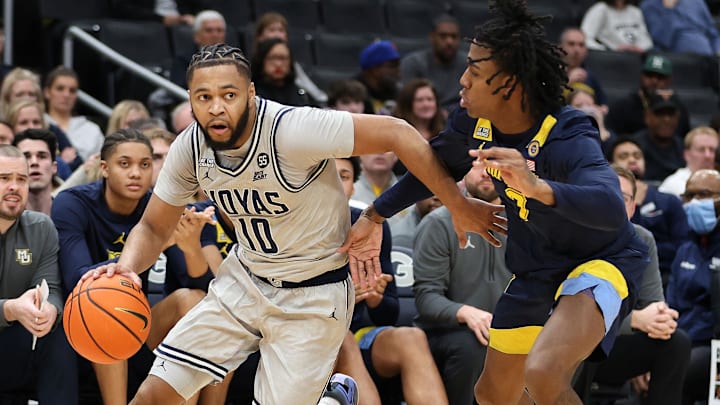 Georgetown Hoyas guard Jayden Epps (10) dribbles the ball past Marquette Golden Eagles guard Zaide Lowery (7) during the first half at Capital One Arena. Georgetown Hoyas guard Jayden Epps (10) dribbles the ball past Marquette Golden Eagles guard Zaide Lowery (7) during the first half at Capital One Arena.