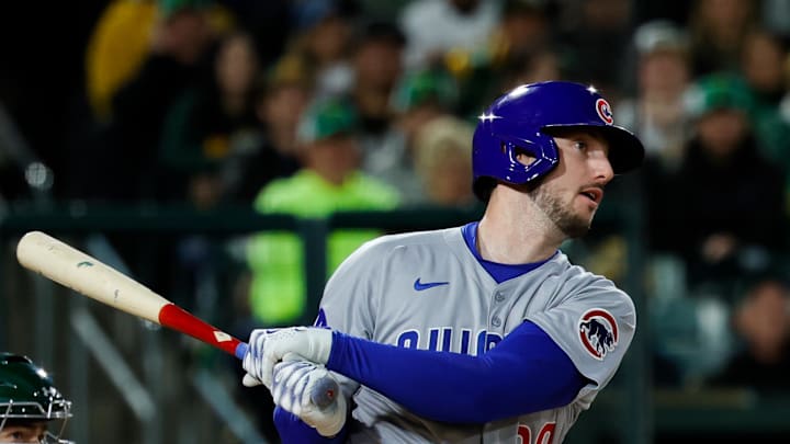 Mar 31, 2025; West Sacramento, California, USA; Chicago Cubs outfielder Kyle Tucker (30) hits a single during the fifth inning against the Athletics at Sutter Health Park. 