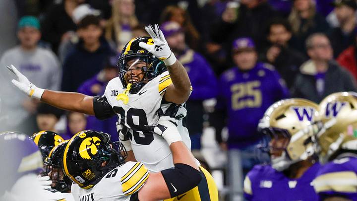 Oct 9, 2026; Seattle, Washington, USA; Iowa Hawkeyes running back Kamari Moulton (28) celebrates after rushing for a touchdown against the Washington Huskies during the first quarter at Husky Stadium. Mandatory Credit: Joe Nicholson-Imagn Images