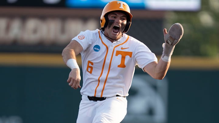 Tennessee's Gavin Kilen (6) leaps in celebration as he rounds the bases after Andrew Fischer (11) hits a home run at the NCAA college baseball Knoxville Regional final against Wake Forest on June 2, 2025, in Knoxville, Tenn.