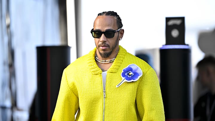 Oct 20, 2024; Austin, Texas, USA; Mercedes AMG Petronas F1 Team driver Lewis Hamilton (44) of Team Great Britain walks through the track entrance before the 2024 Formula One US Grand Prix at Circuit of the Americas. Mandatory Credit: Jerome Miron-Imagn Images