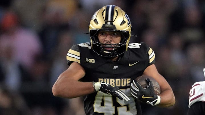 Purdue Boilermakers running back Devin Mockobee (45) runs 